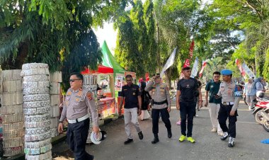 Polisi Kawal CFD dan Bazar di Dharmasraya, Arus Lalu Lintas Jalur Lintas Sumatera Tetap Lancar